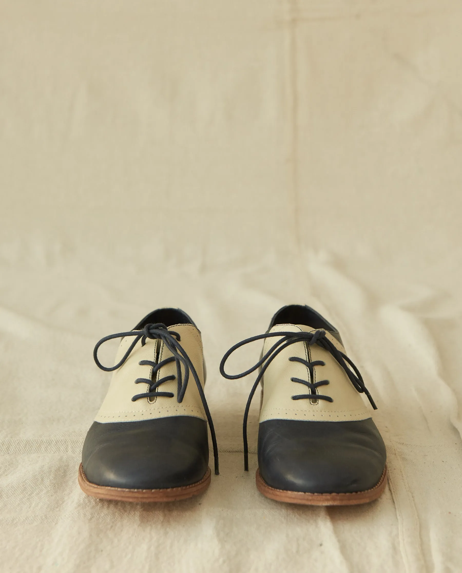 The Saddle Shoe. -- Navy And Vanilla